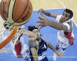 Iran's Hamed Ehadadi, right, goes for a rebound against Argentina's Luis Alberto Scola